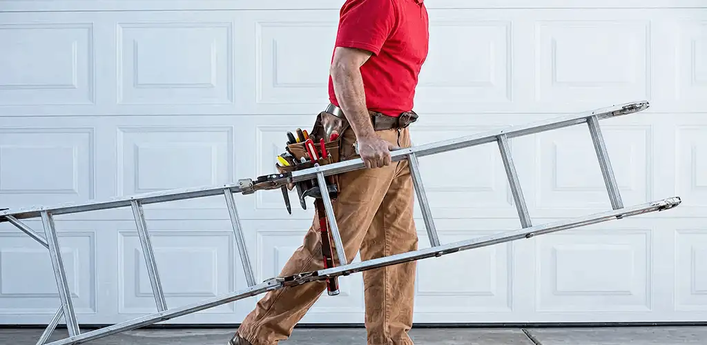 Garage door repair technician arriving with tools and ladder in Pembroke Pines, FL