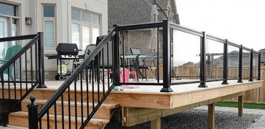 Handrail installation on a deck staircase for safety and code compliance in Pembroke Pines, FL